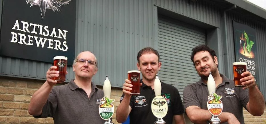Brewers Dave Sanders, Matthew Taylor and Dimitrios Papaoikonomou raise a glass to exciting times at 