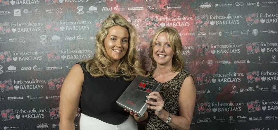 Emma Long of Bizspace presenting an award at the 2015 Red Rose Awards