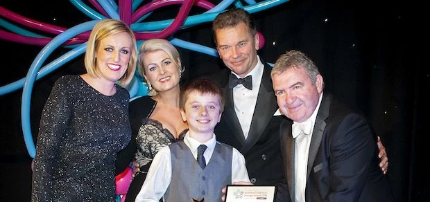 Reward’s Tom Flannery (right) presents an award at the successful event