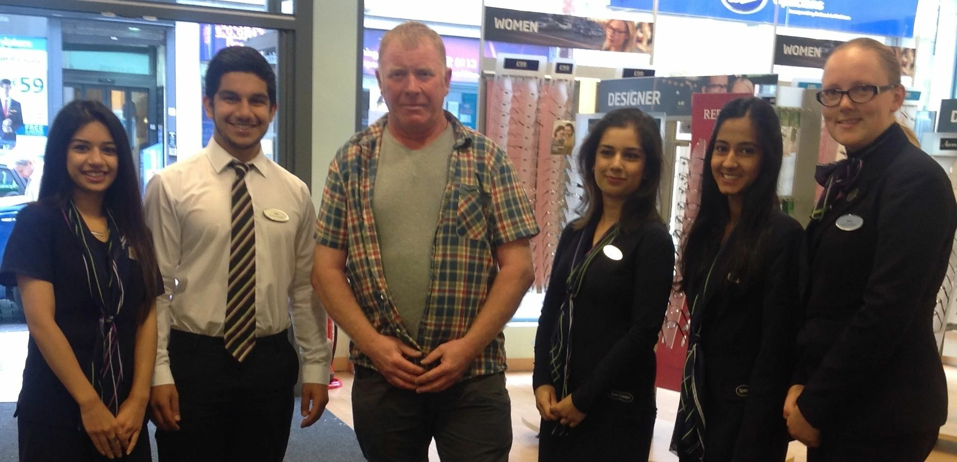 Specsavers staff with winning customer