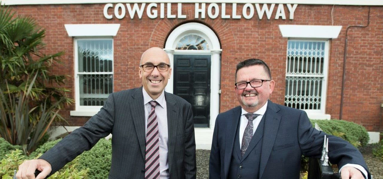 Paul Stansfield Managing Partner of Cowgill Holloway wiith Senior Partner Patrick Lydon of Warings