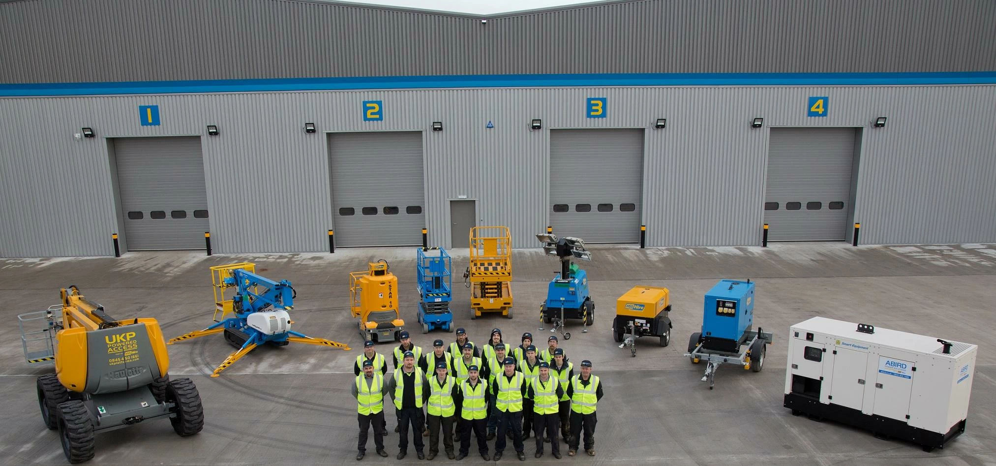 The Old Trafford HSS team outside the newly expanded refurbishment centre