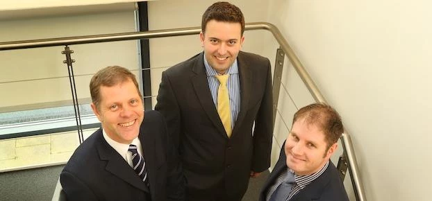 Three of the RMT team that worked on the project - from left, head of corporate finance Greg Bolton,