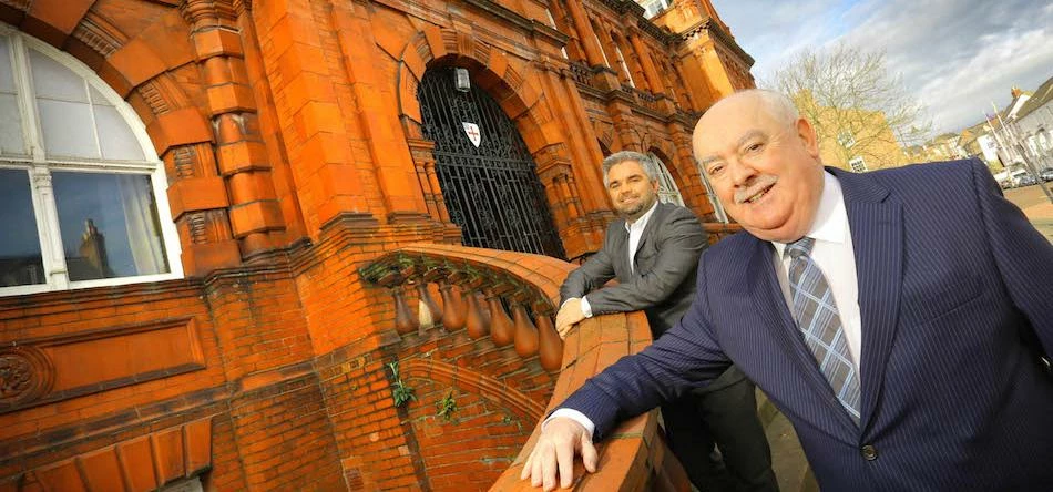 Kevin Brown (front) and business partner Shaun Crawley on the steps of the Shire Hall in Durham.