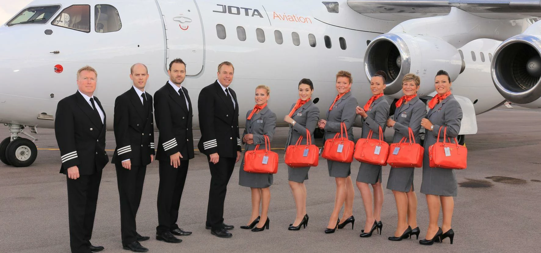 Jota Airline's smart new crew uniform accessories produced by Recognition Express Essex