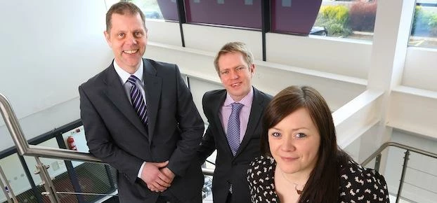 Alison Gardiner of Born Digital with (back, from left) Greg Bolton and Graham Brown of RMT Accountan