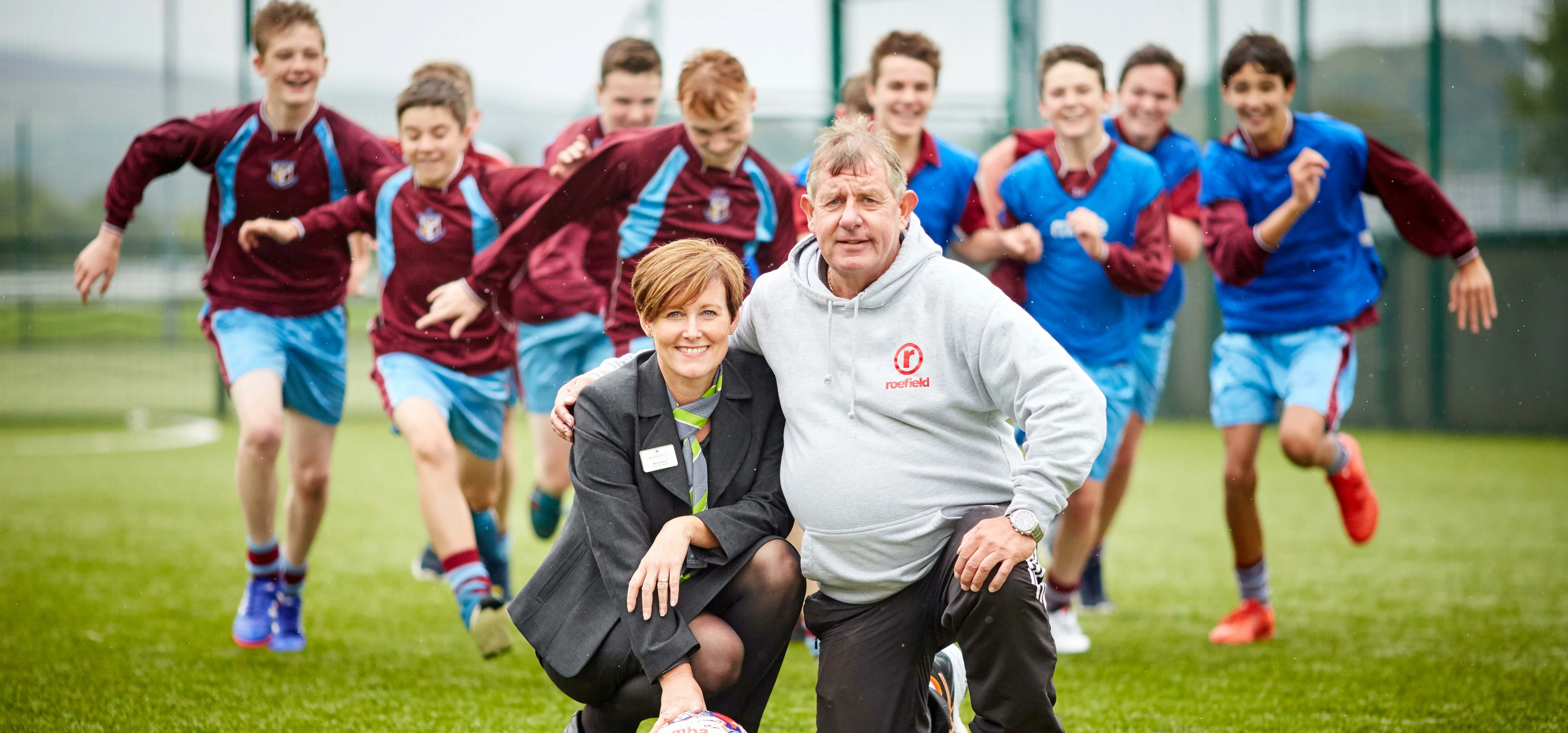 Debbie Ward from Barratt Homes and Neil Ashworth from Roefield Leisure Centre