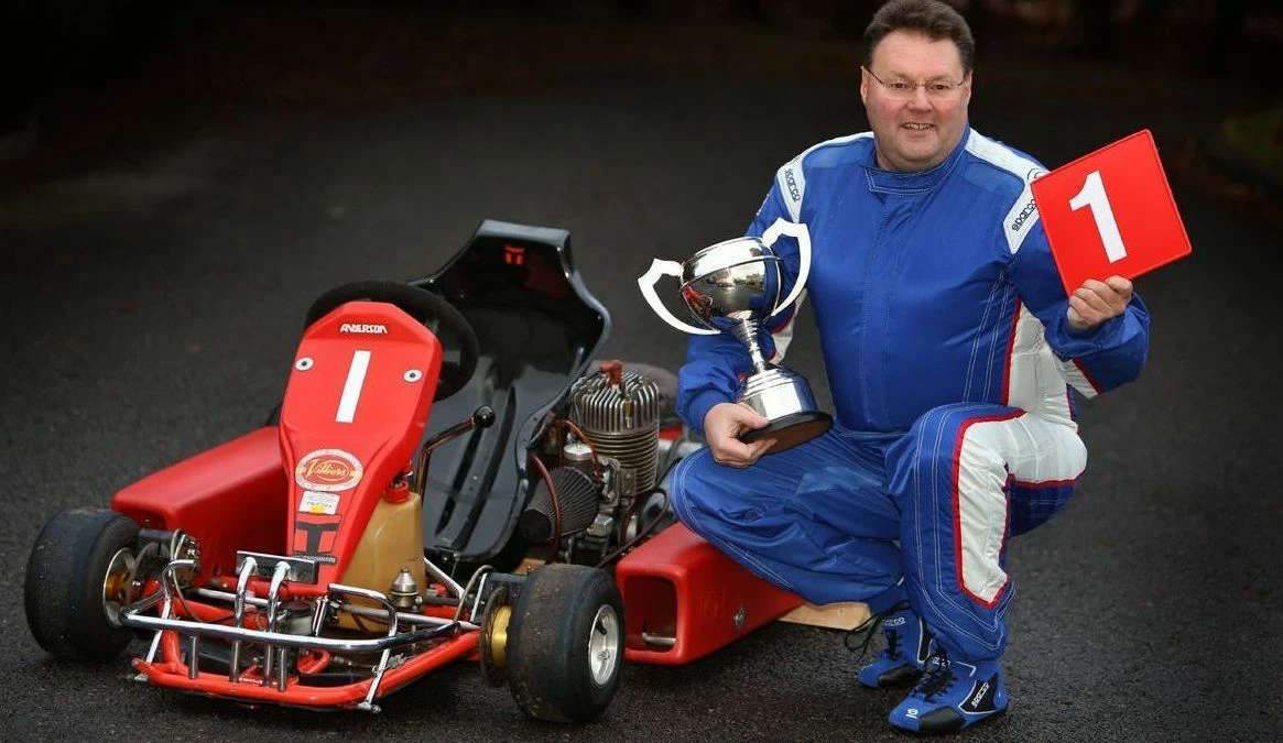 Graham Payne, managing director of Darchem Engineering, receives his MSA British Kart Championship a