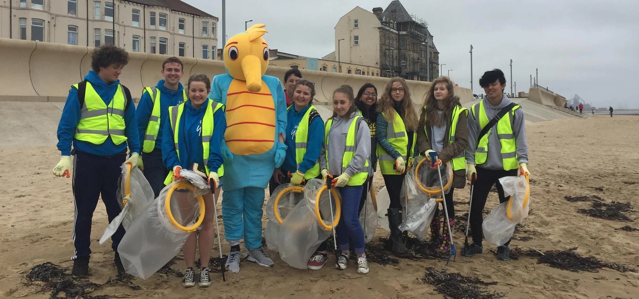 The National Citizen Service (NCS) North East youth board at the Redcar beach clean-up