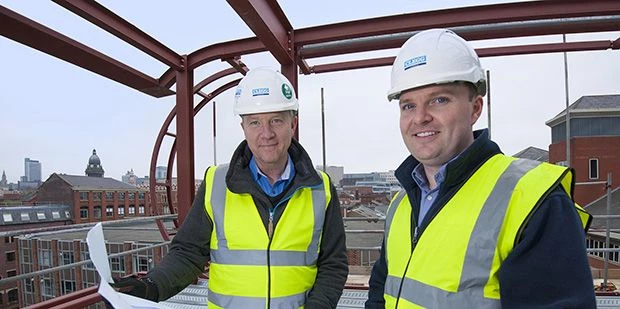 Project Manager, Clegg Construction and  Peter Haywood (wearing grey gloves), Construction Manager, 