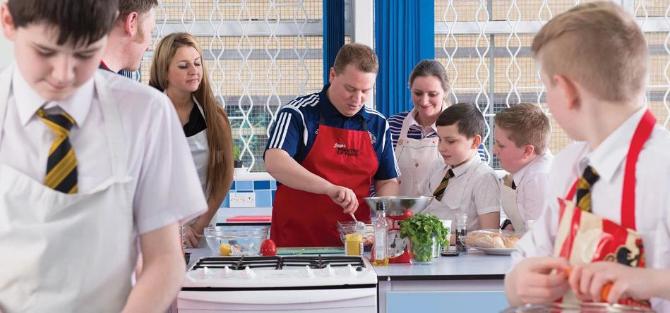 Families cooking with Foundation of Light and Jamie's Ministry of Food