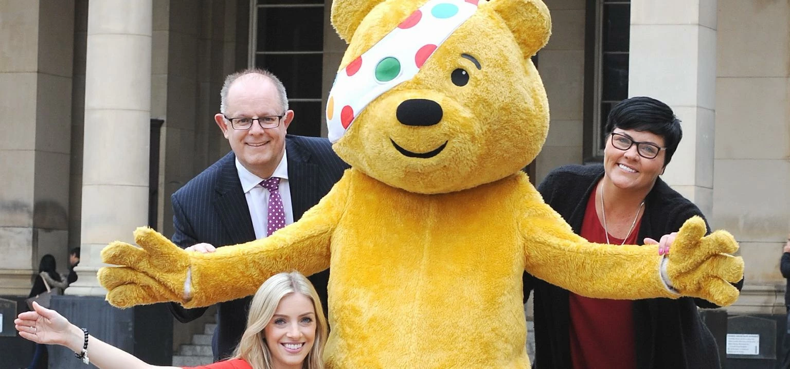 Pudsey with Mark Cadwallader, Laura Richards (Birmingham Children’s Hospital Charity, front), and Ge