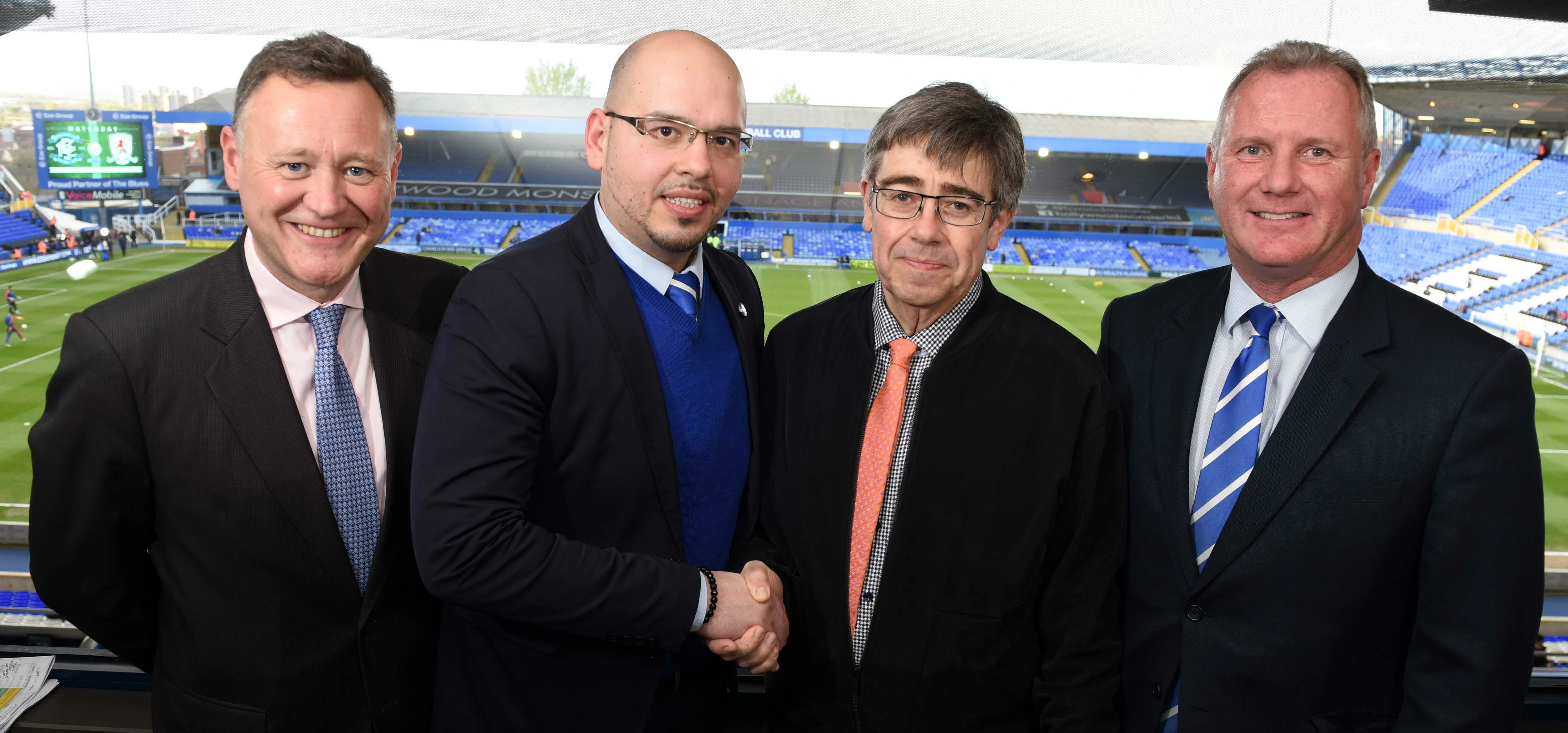 Sealing the deal at St Andrews, from left: Barrister Adrian Keeling QC, Blues’ director Panos Pavlak