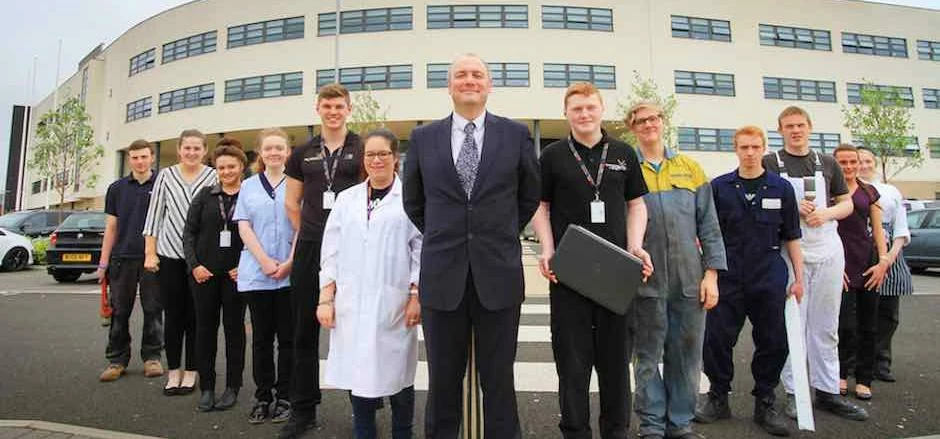 Principle Darren Hankey with apprentices from Hartlepool College of Further Education 