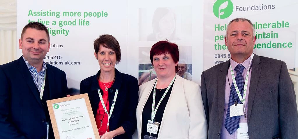 The Four Housing team collect the award at the House of Lords