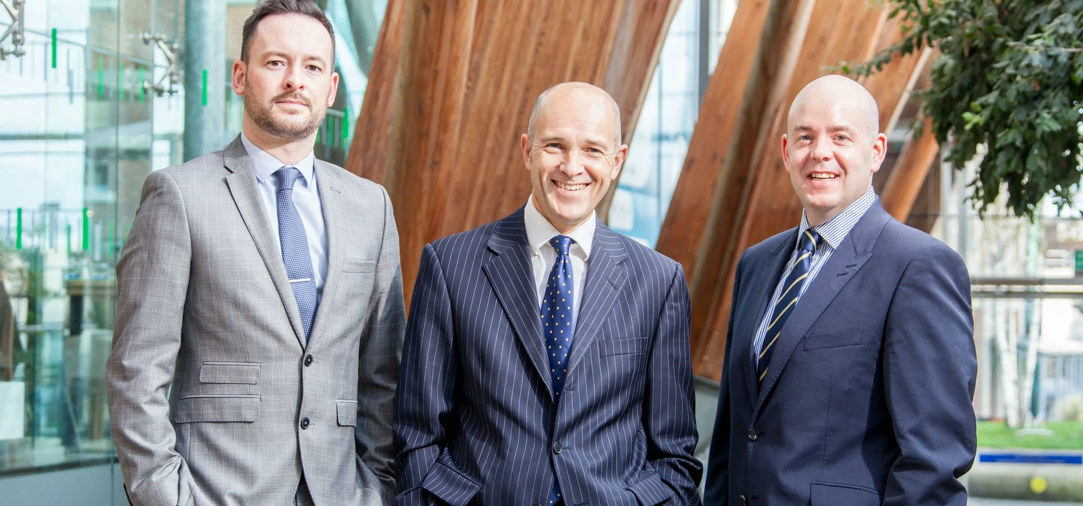 Head of busines legal services, Rob Moore (centre), welcomes Richard Dale (left) and James Parden (r