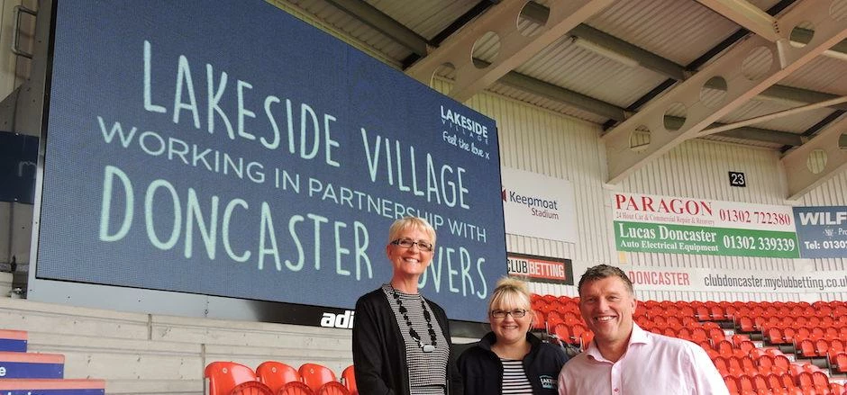 Cheryl Sadler and Lyndsey Parry from Lakeside Village with Gavin Baldwin.