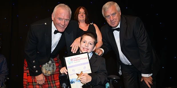 Winner George Pearson, with Eddie Gray and Peter Lorimer