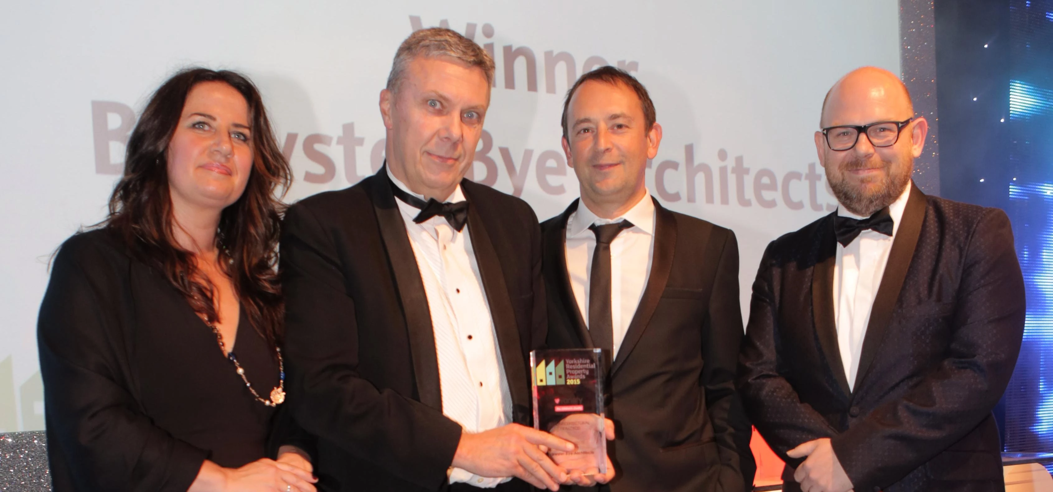 Brewster Bye Architects collect their award 