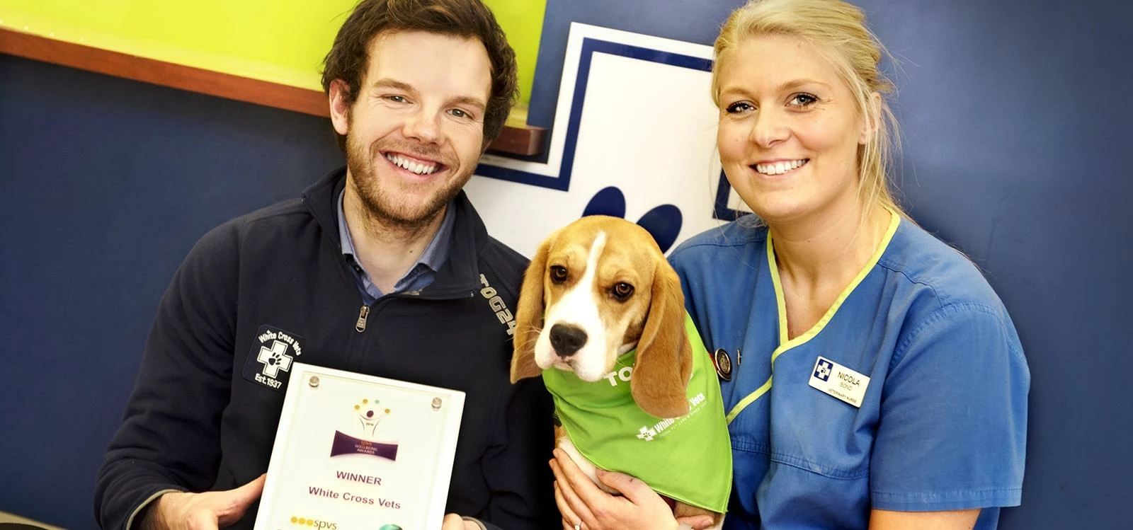 Ed Newbould, head of team engagement and development at White Cross Vets with veterinary nurse Nicol