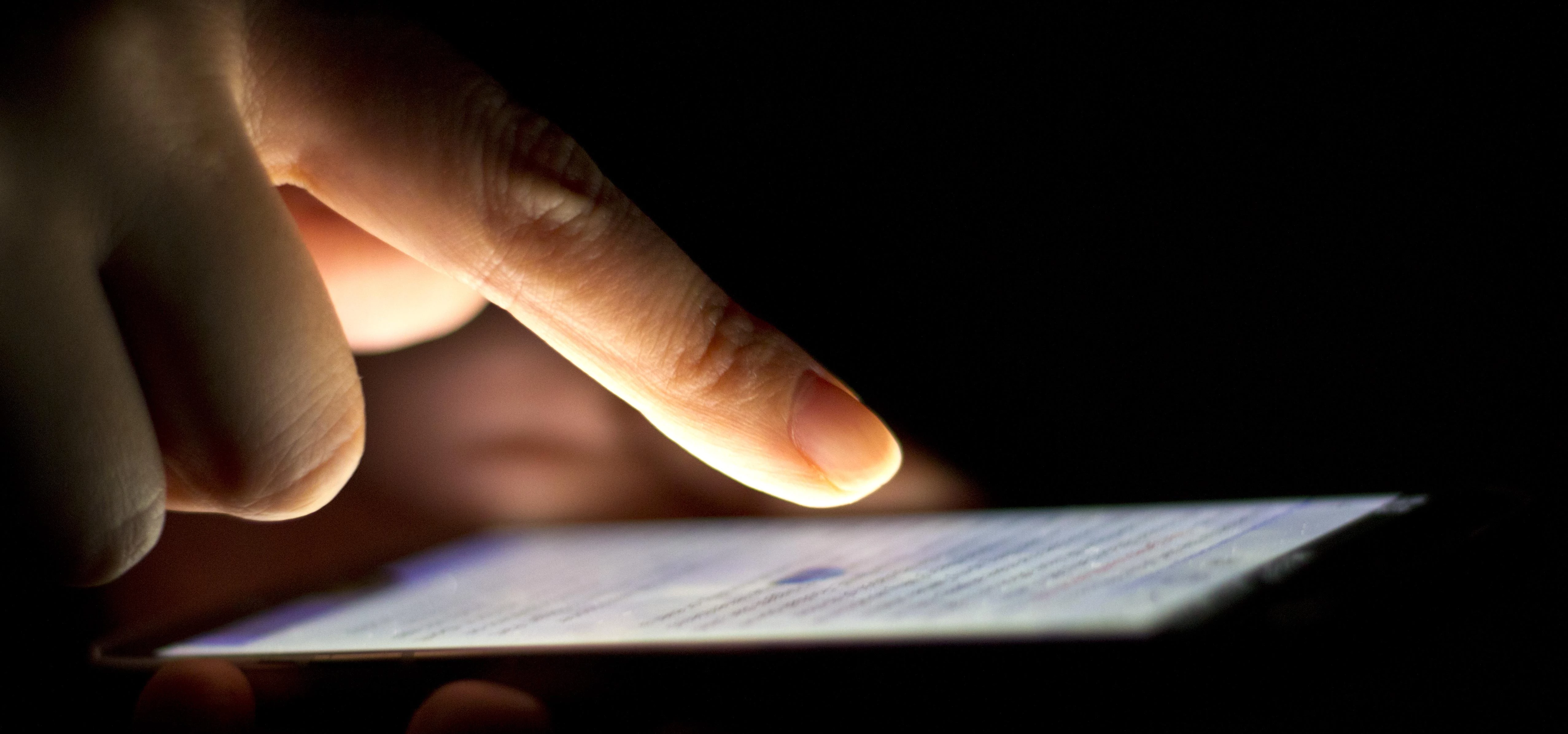 Close up person using smartphone