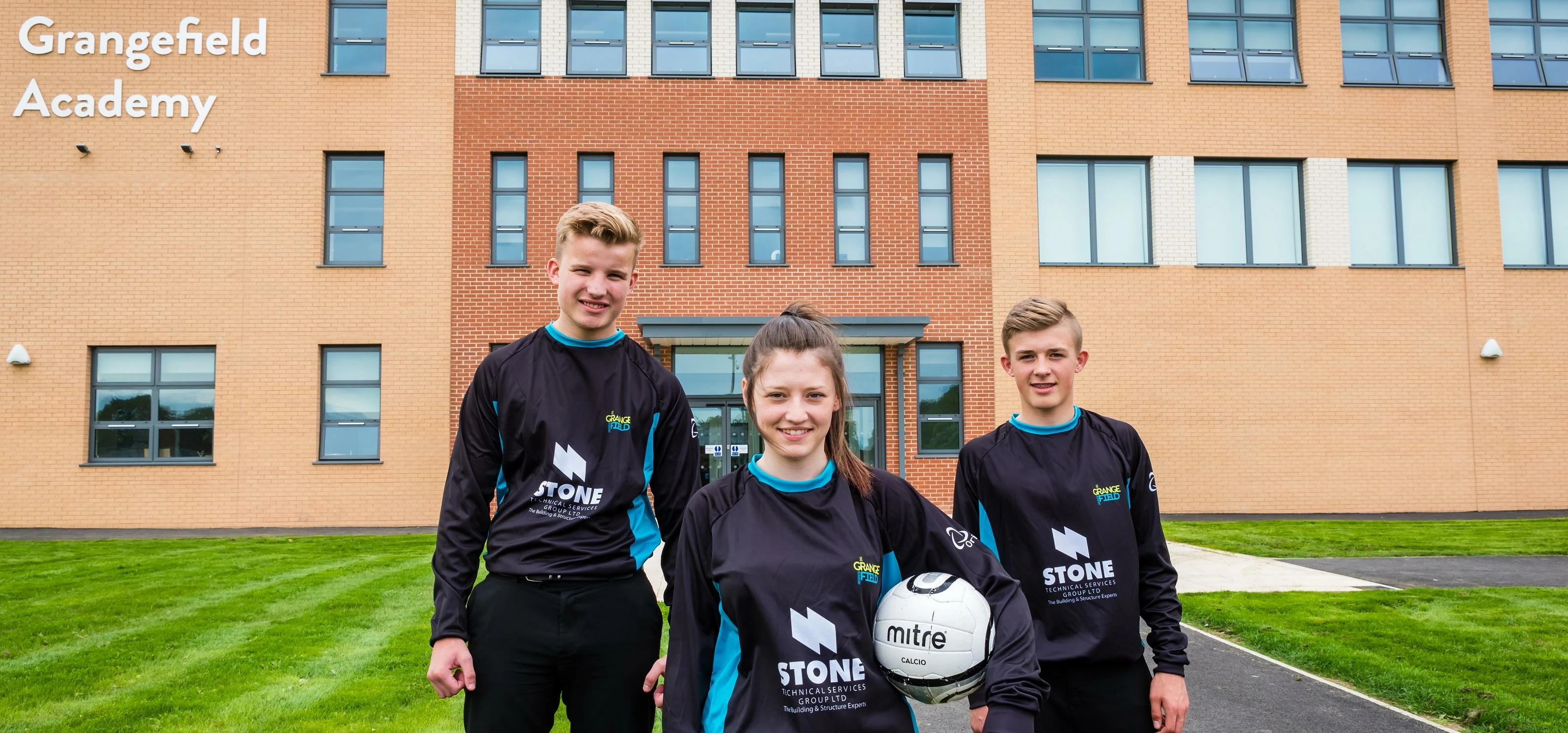 Alex McArthur, Lara Hebner and Curtis Larsen from the Grangefield Academy in their new kit
