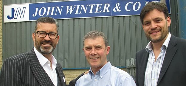 Dale Lister, Managing director John Winter (centre) with Huddersfield Town and TDS (award sponsors) 