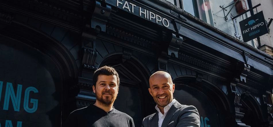 Fat Hippo founder Michael Phillips and Bradley Hall operations director Peter Bartley