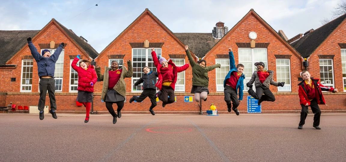 Pupils at Raddlebarn Primary School leap for joy thanks to their £1,000 donation