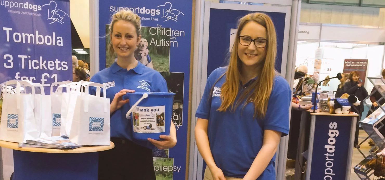Claire Fletcher (left) and Jenni Arundale help out Taylor&Emmet's annual charity, Support Dogs, at C