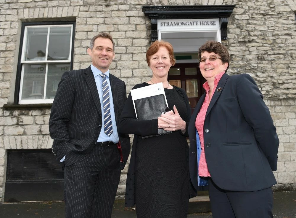 John Chesworth, Naomi Fell and Jan Wright outside the new Kendal office