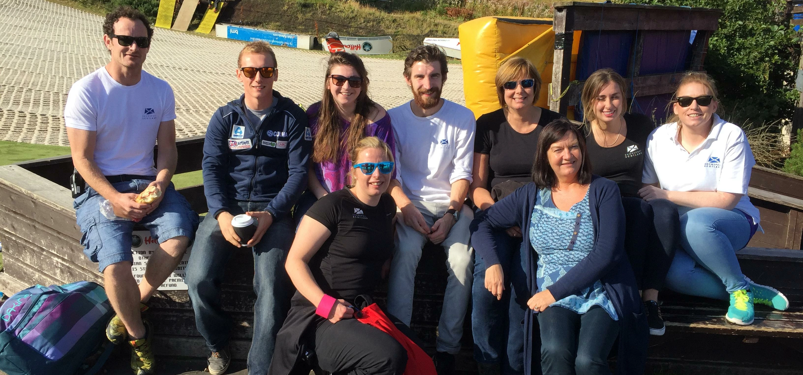 Jane (3rd from the right, back row) and some of the Snowsport Scotland team. Image credit to racer-r