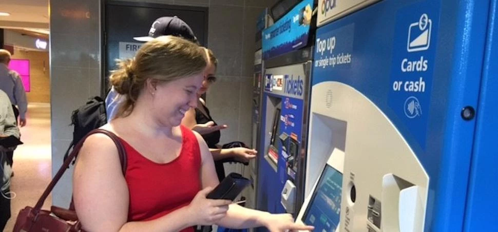 Customers using Parkeon's self-service machines.