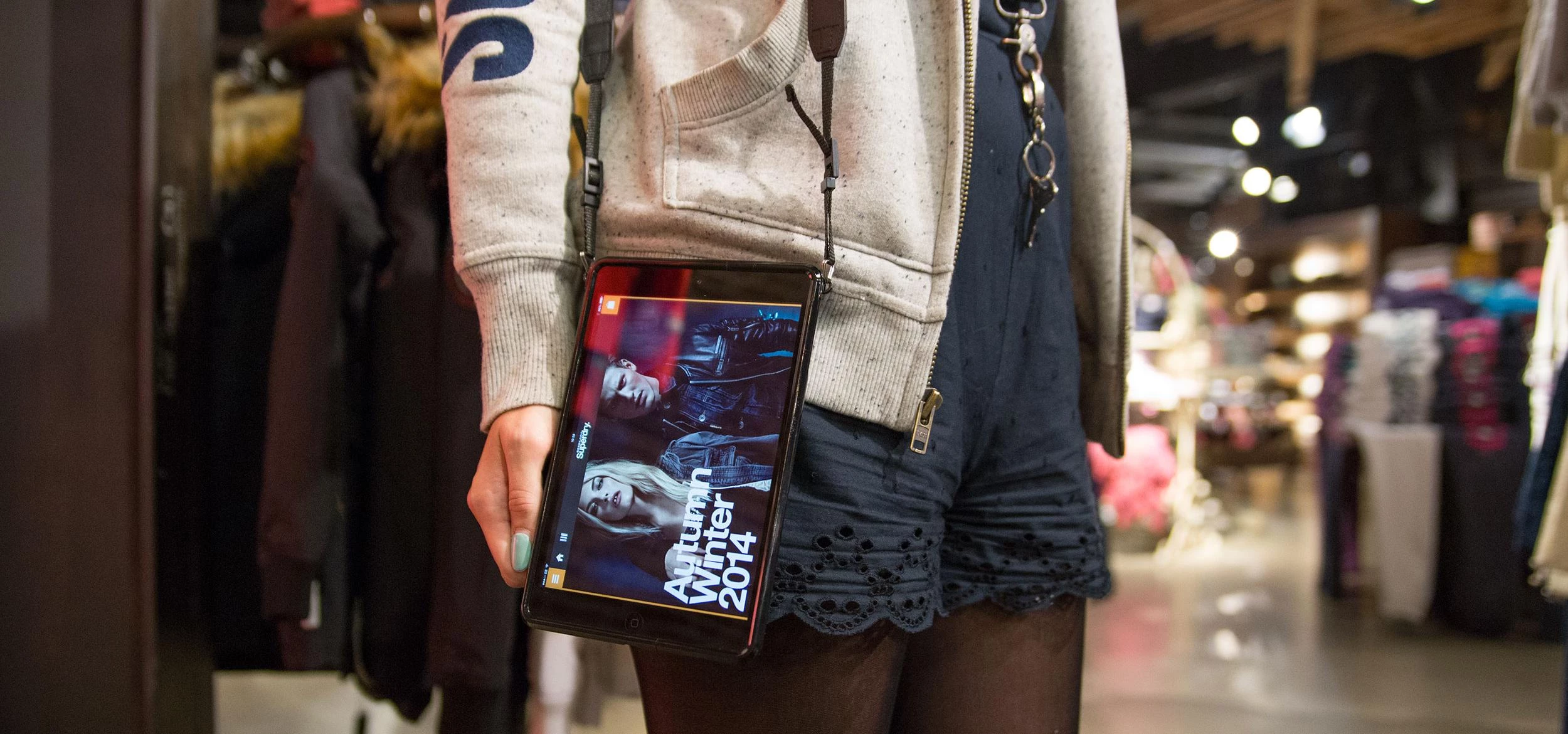 In-store iPads carried by Superdry sales assistants 