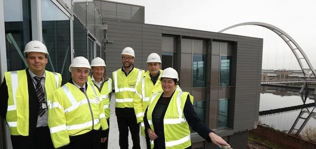 Celebrating progress on site, from left to right: Phil Cowan, Strategic Property Manager, Thirteen;