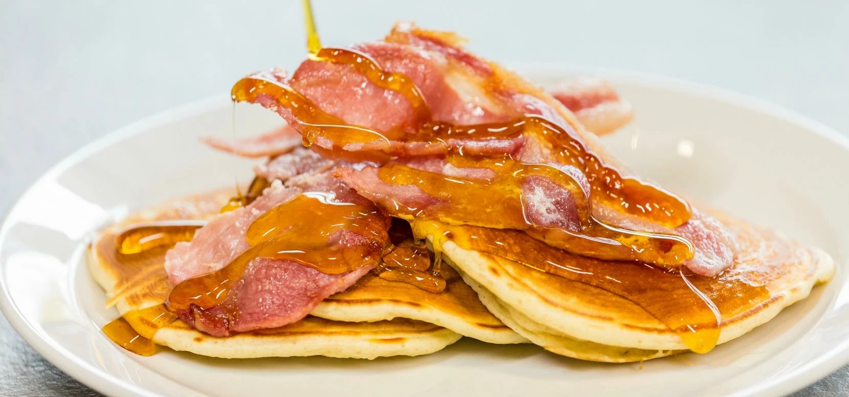 Ultimate Cafe's American Pancakes with Bacon and Maple Syrup