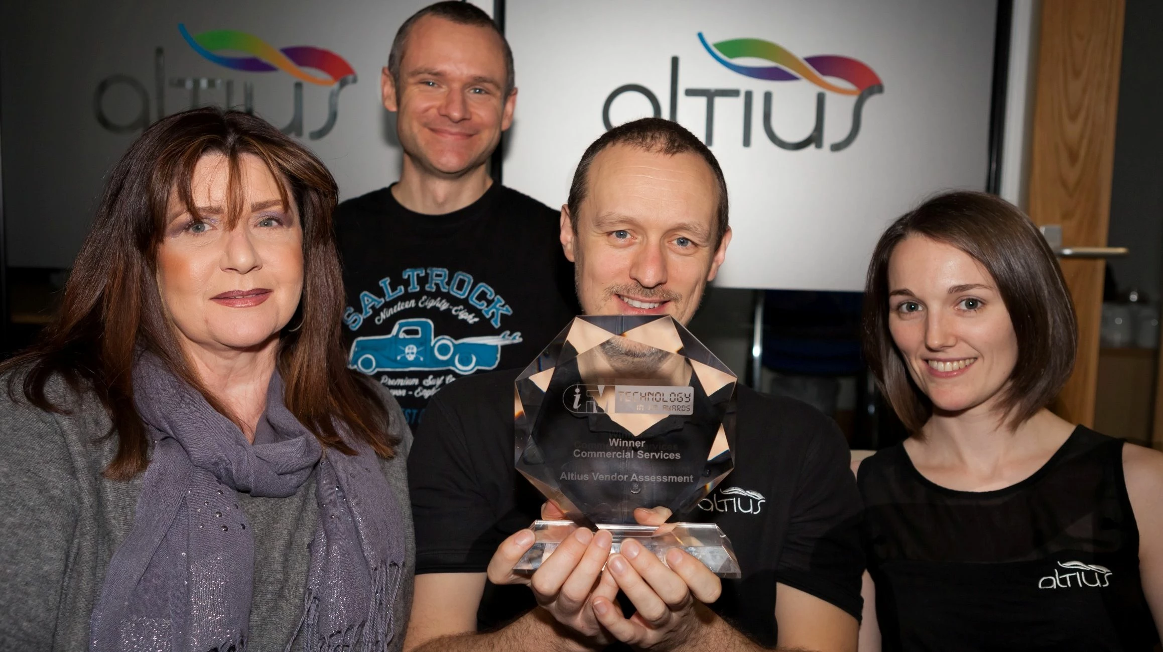 Members of the Altius team celebrate award success. Pictured (l-r) Sally Peberday, Neal Chamen, Len 