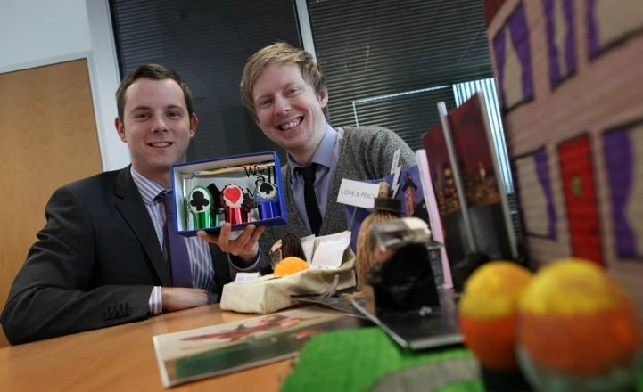 Competition winner James Hay holding the 'Mad Hatters Egg Party' is joined by Anthony Suddes (in sui