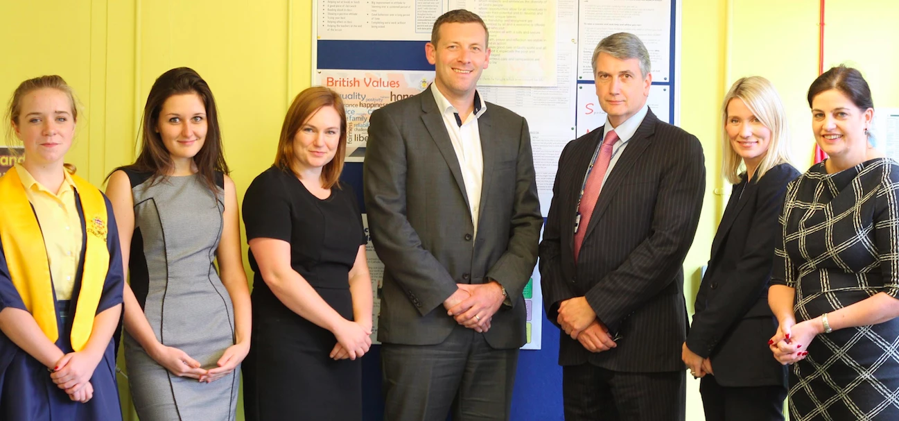 St. Julie's head teacher Tim Alderman (third from right) with pupils and members of Lloyds Bank St. 