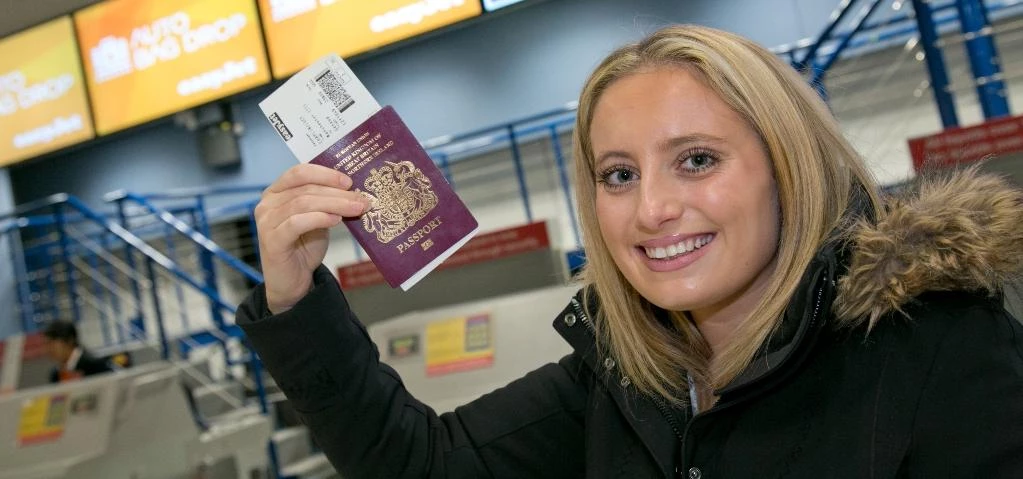 Pictured: easyJet customer Lucy Chaplin was Manchester Airport's 23 millionth passenger in the 12 mo