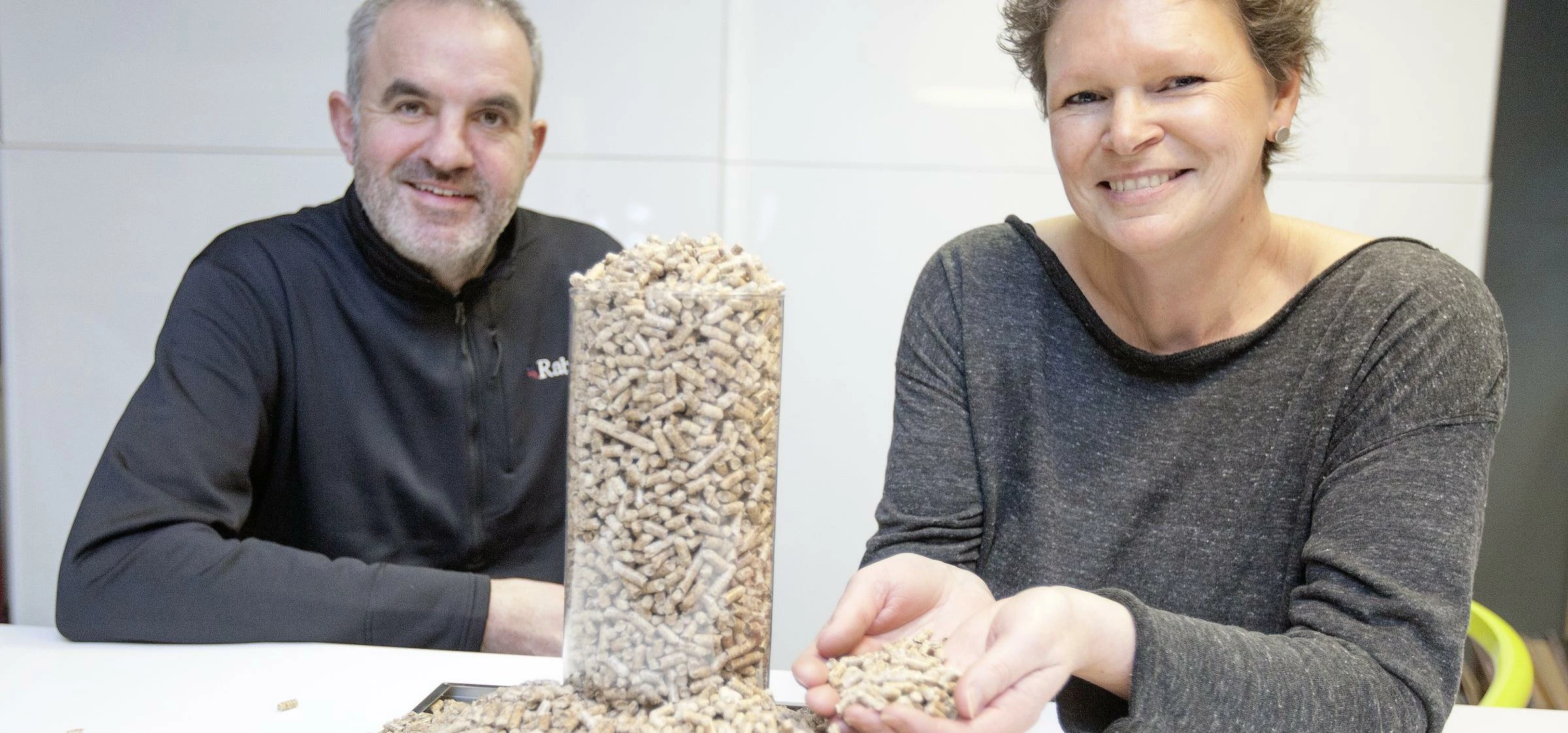 Michael and Kate Wright, of Yorkshire Heat Pumps, with biomass pellets