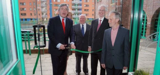 Gordon Brown celebrates the success of the historic mill business centre 25 years after reopening.