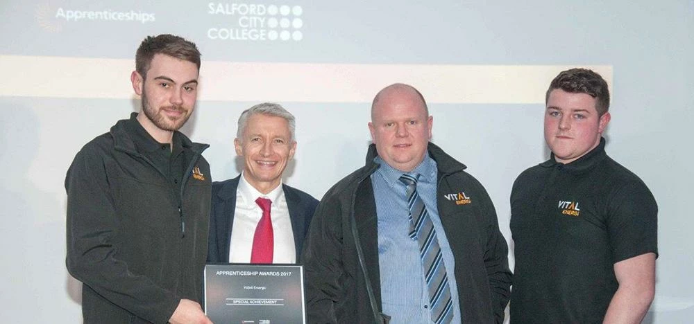 Vital Energi receiving a “Special Achievement Award” from Salford City College