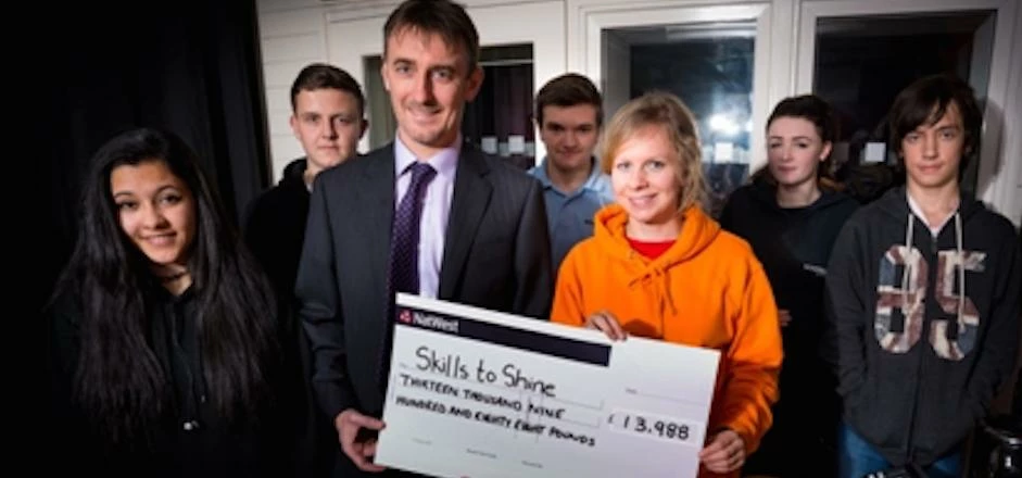 Jason Heywood from NatWest with some of the service users at Skills to Shine.