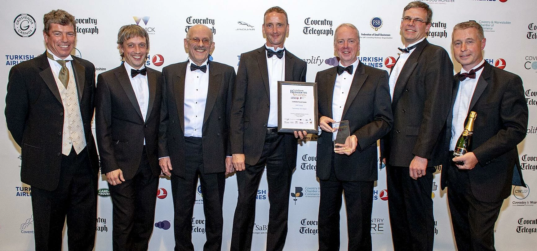RDM staff celebrate winning the Technology and Digital Award