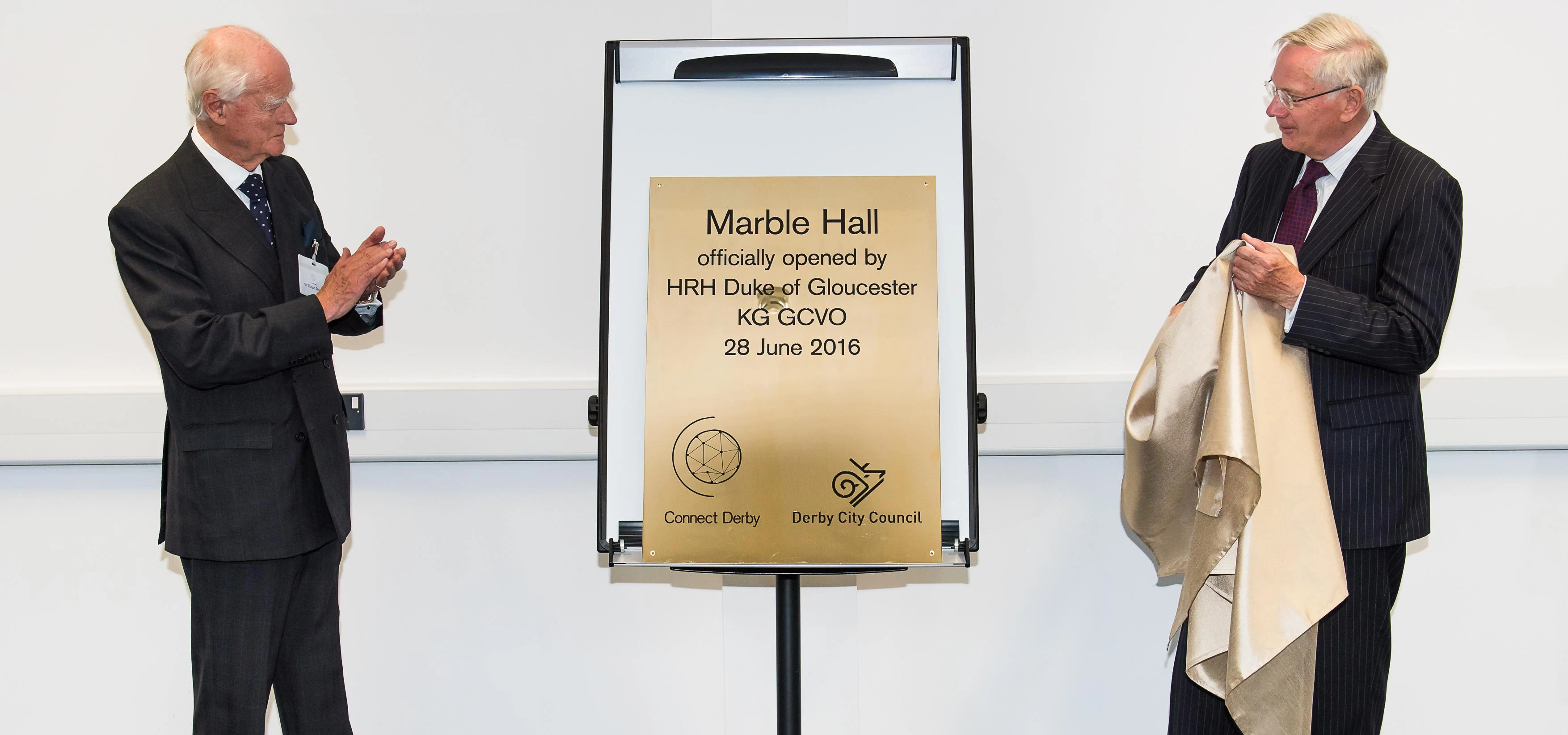 HRH Duke of Gloucester (right) and Sir Ralph Robins (left) pictured unveiling the Marble Hall plaque