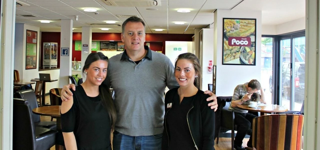 Twins Emma and Holly Westerside with Richard Sutton