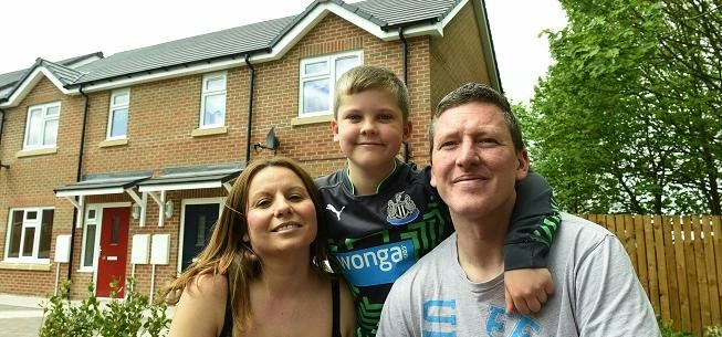 The first tenants at Mary’s Place in Gateshead: Michelle Gibson and Steven Graham and their 8 year-o