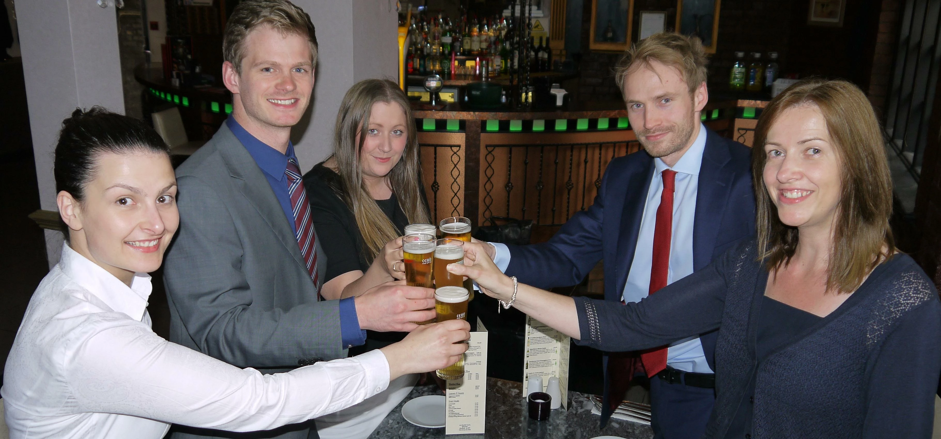 Toasting fundraising success: hlw Keeble Hawson participants clockwise from left: Emma Baker, Russel