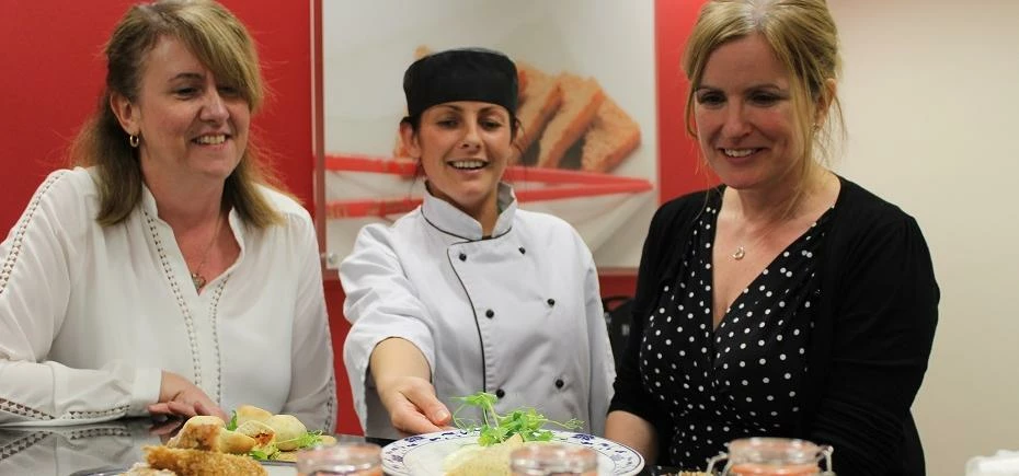 SH Chilled Foods’ Development and Innovation Chef Jane Beesley shows Julie Knight (left) and Michell